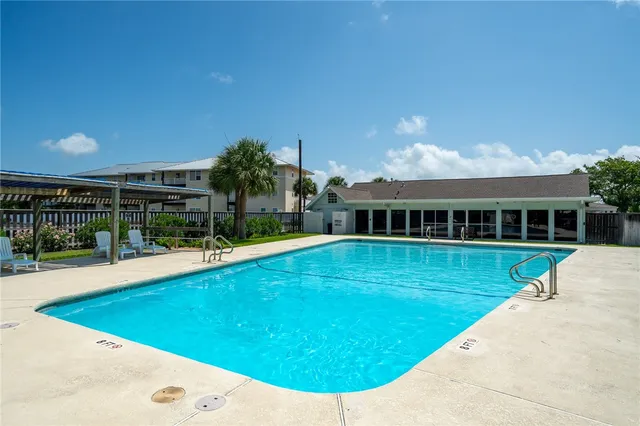 a view of a house with a swimming pool