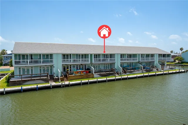 a view of a swimming pool and lounge chair