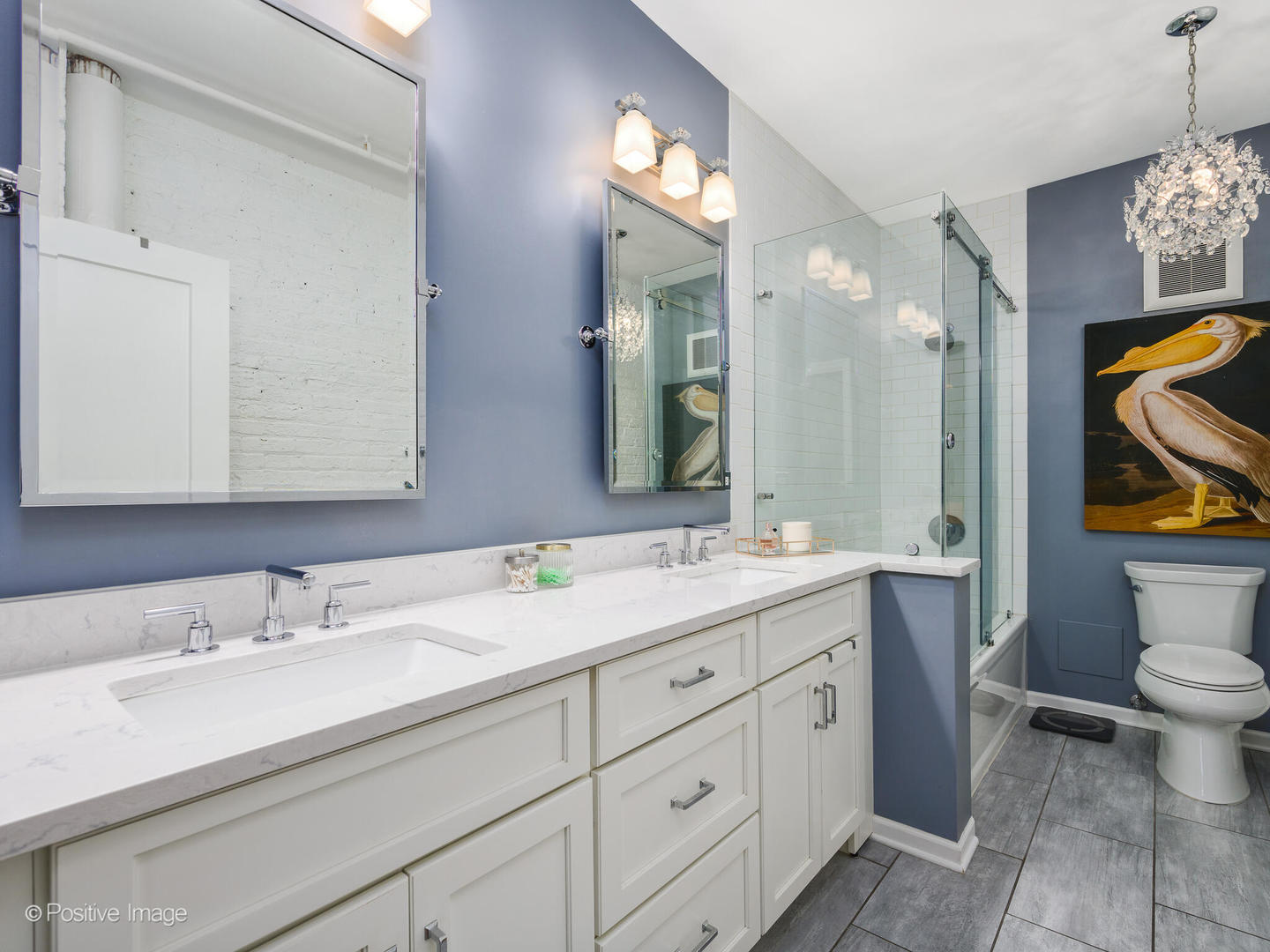 203 South Sangamon Street, Unit 216 Chicago, IL 60607 - Photo 16 of 22 a bathroom with a toilet sink and mirror