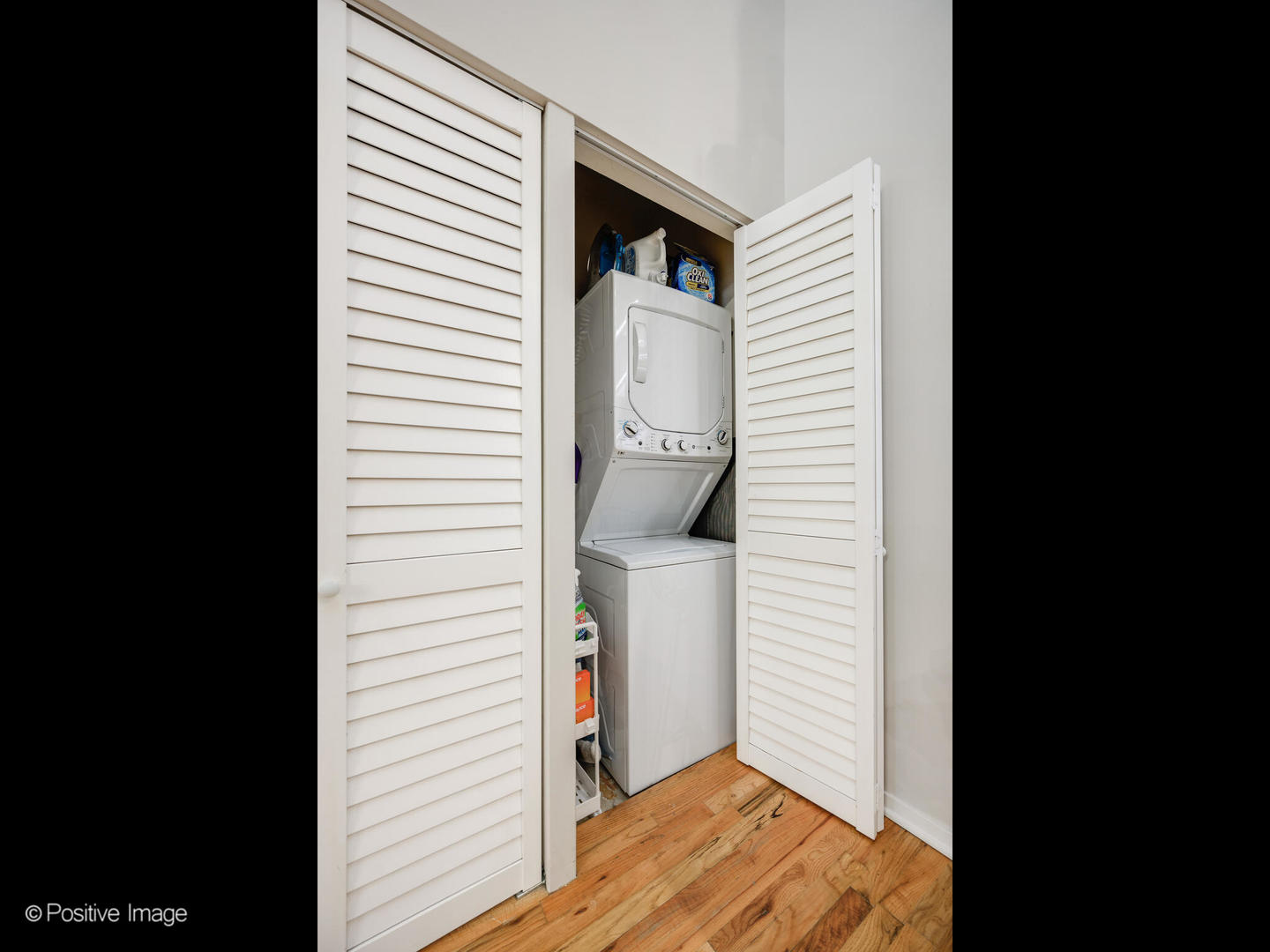 203 South Sangamon Street, Unit 216 Chicago, IL 60607 - Photo 17 of 22 a view of a bedroom with a bed and a window