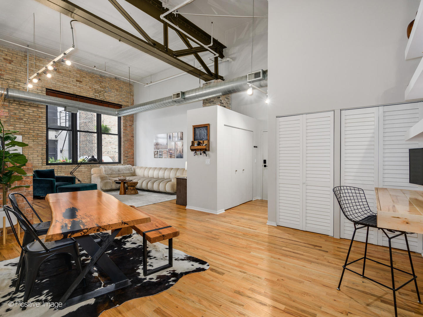 203 South Sangamon Street, Unit 216 Chicago, IL 60607 - Photo 3 of 22 a view of a room with gym equipment