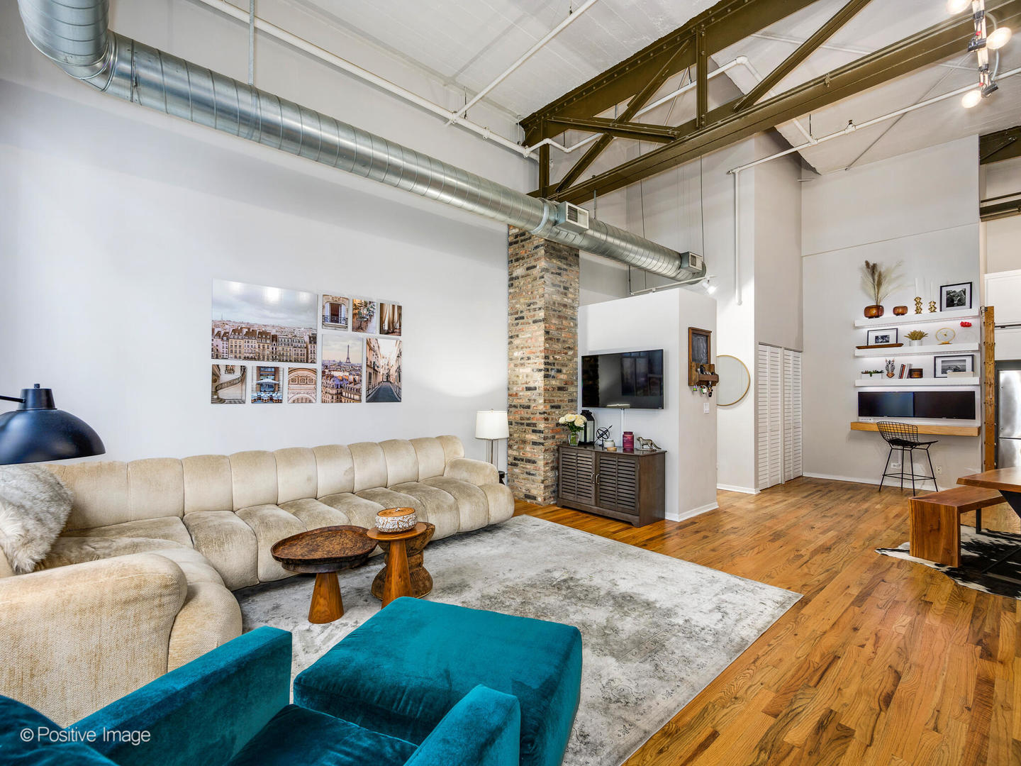203 South Sangamon Street, Unit 216 Chicago, IL 60607 - Photo 7 of 22 a living room with furniture and a flat screen tv