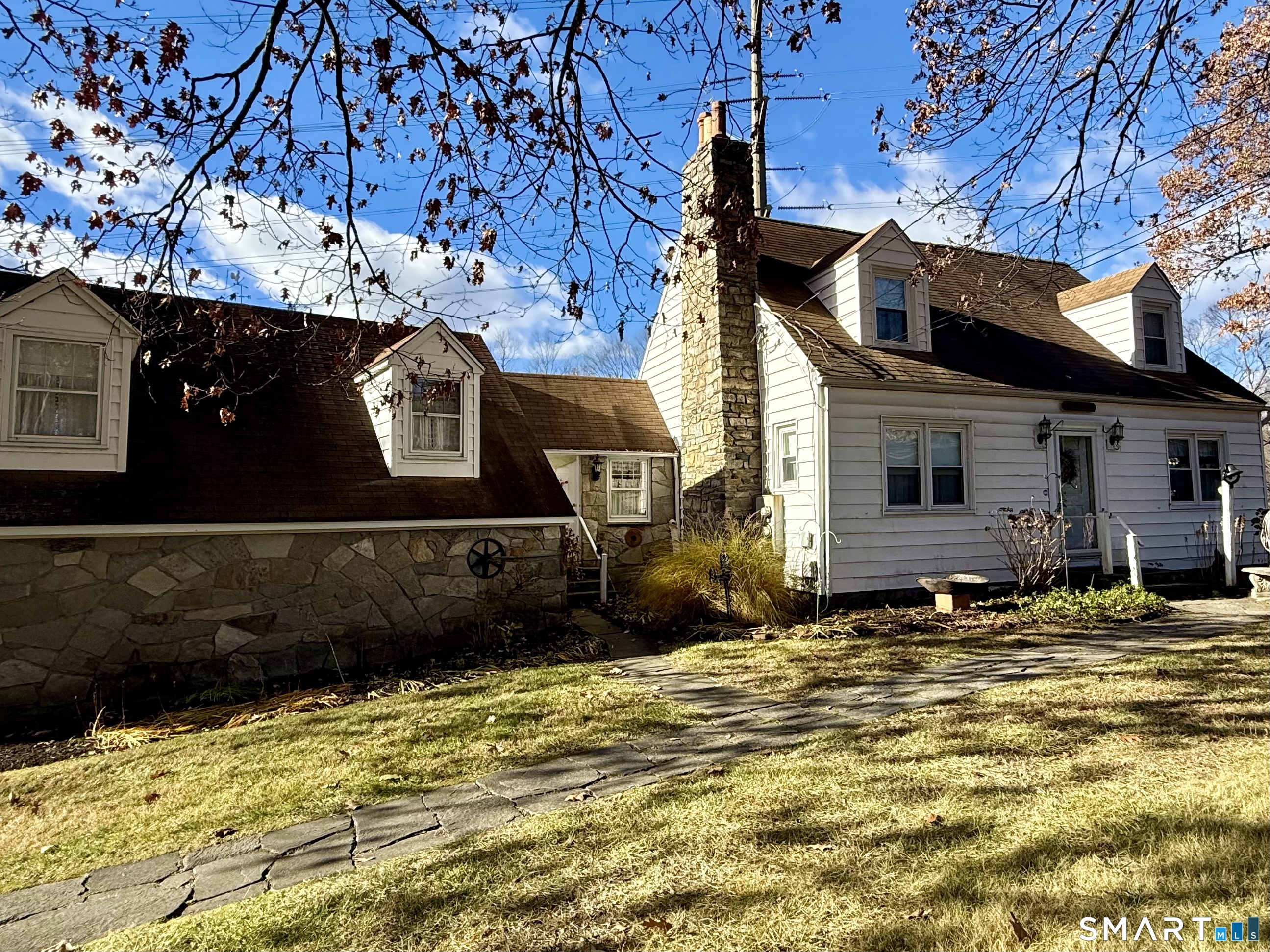a view of a house with a yard