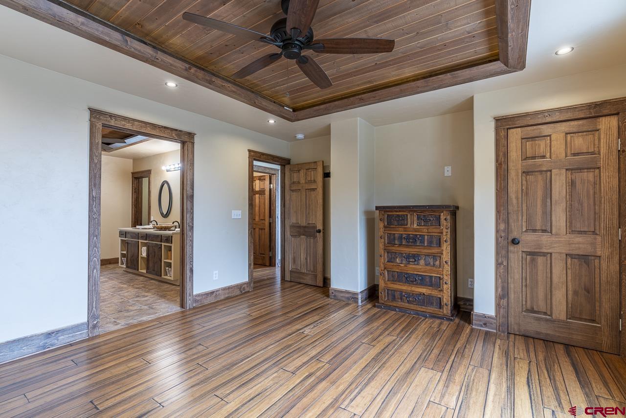 1550 Silver Mesa Driveway Durango, CO 81301 - Photo 21 of 34 wooden floor in an empty room