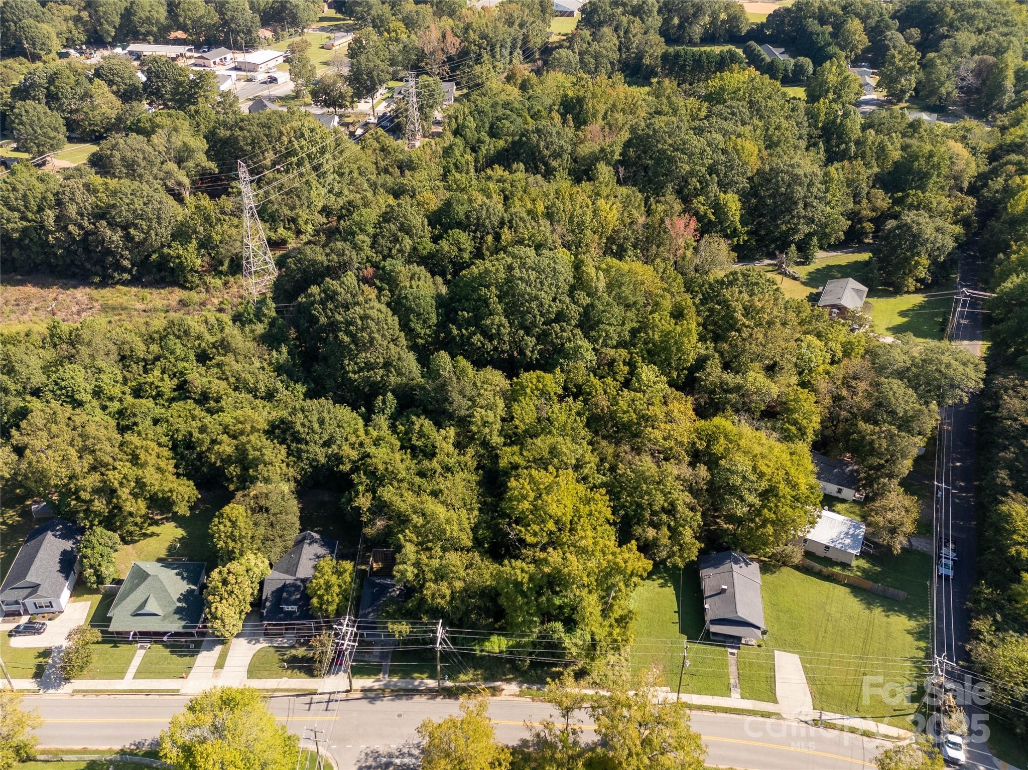 218 East Madison Street York, SC 29745 - Photo 2 of 17 a view of residential houses with yard