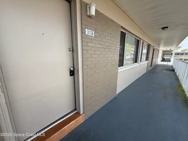 a view of livingroom with hardwood floor and window
