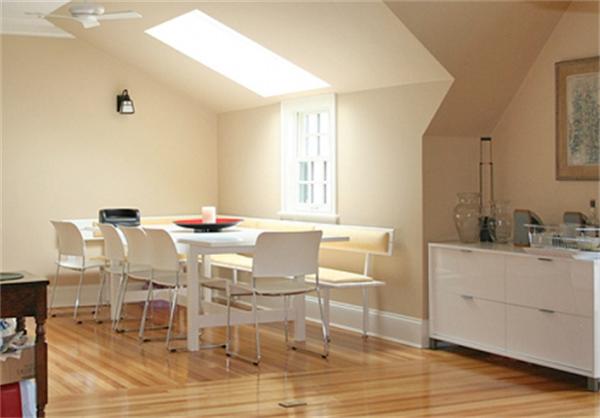 575 Tuckerman Avenue, Unit P Middletown, RI 02842 - Photo 11 of 30 a dining room with wooden floor and white walls