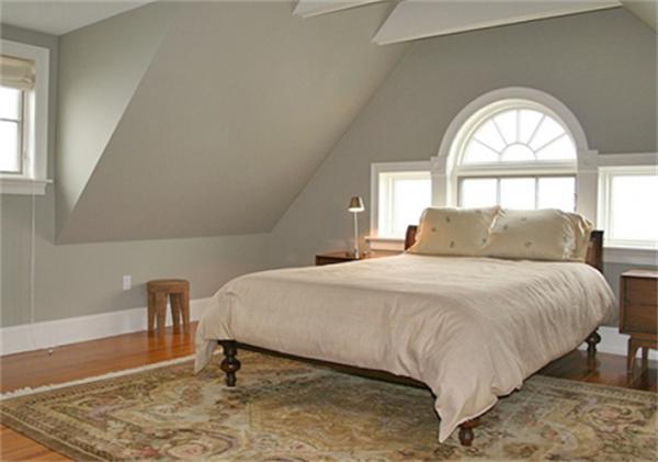 575 Tuckerman Avenue, Unit P Middletown, RI 02842 - Photo 13 of 30 a bedroom with a bed and a large window