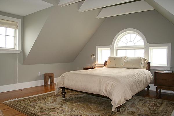 575 Tuckerman Avenue, Unit P Middletown, RI 02842 - Photo 16 of 30 a bedroom with a bed and a window