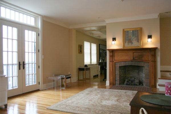 575 Tuckerman Avenue, Unit P Middletown, RI 02842 - Photo 18 of 30 a living room with furniture a window and a fireplace
