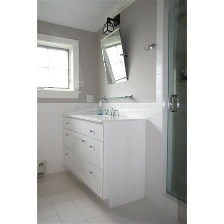 575 Tuckerman Avenue, Unit P Middletown, RI 02842 - Photo 19 of 30 a bathroom with a sink vanity and mirror
