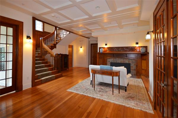 575 Tuckerman Avenue, Unit P Middletown, RI 02842 - Photo 20 of 30 a living room with furniture and a fireplace