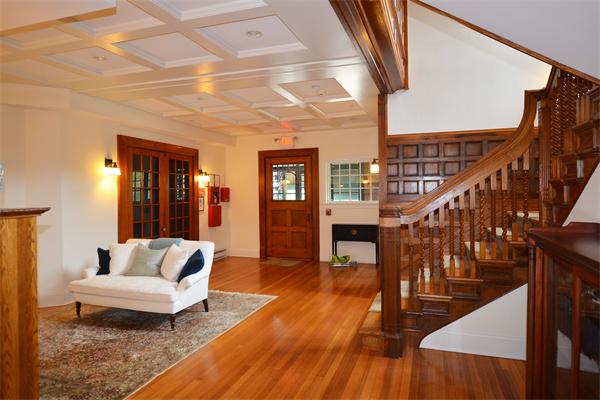575 Tuckerman Avenue, Unit P Middletown, RI 02842 - Photo 21 of 30 a living room with furniture and a rug