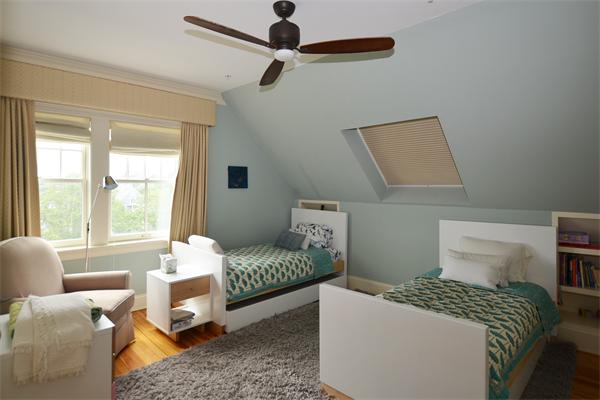 575 Tuckerman Avenue, Unit P Middletown, RI 02842 - Photo 29 of 30 a bedroom with a bed and a window
