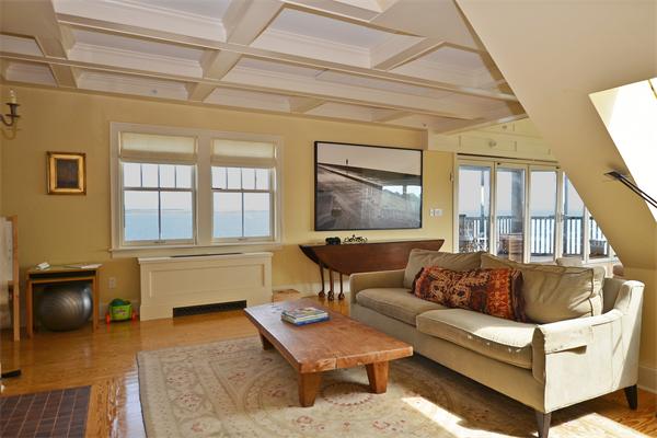 575 Tuckerman Avenue, Unit P Middletown, RI 02842 - Photo 7 of 30 a living room with furniture and a window