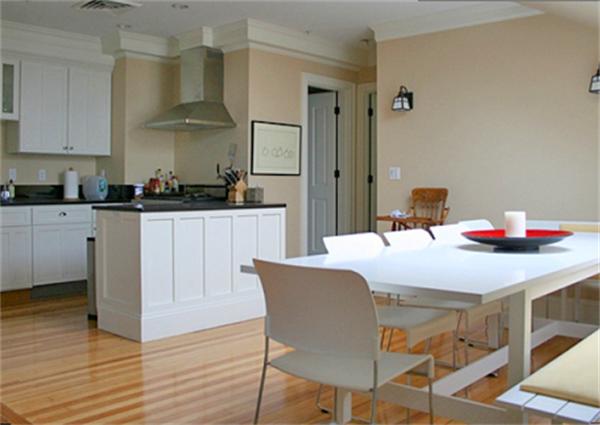 575 Tuckerman Avenue, Unit P Middletown, RI 02842 - Photo 10 of 30 a kitchen with stainless steel appliances a table and chairs in it