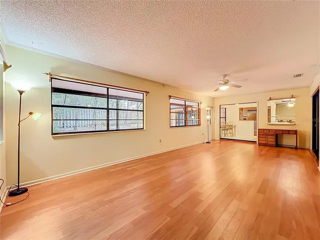 a view of a back yard from a patio
