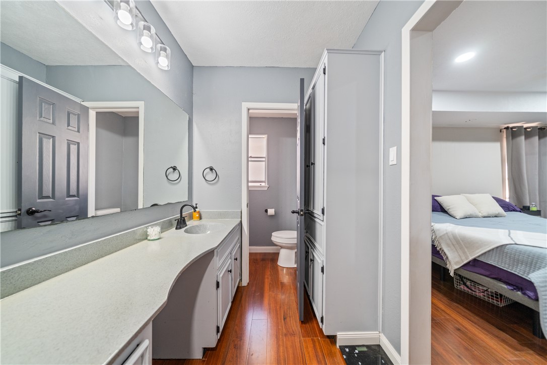 2217 Post Oak Drive Portland, TX 78374 - Photo 20 of 39 a en suite bathroom with a sink and a mirror