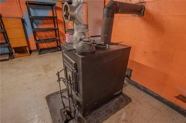 a bathroom with a granite countertop sink a mirror and a shower