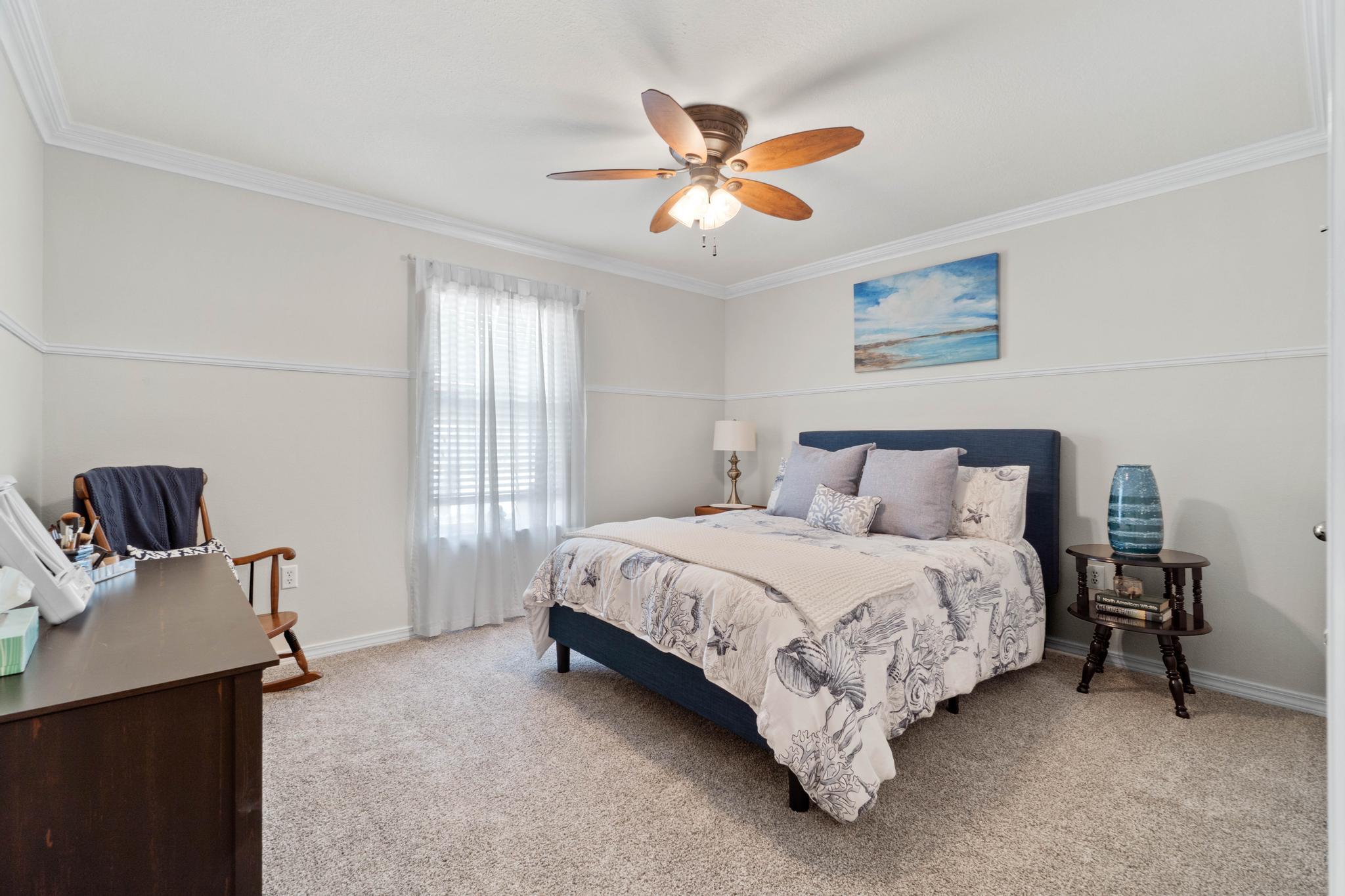 99 Inlet Drive Santa Rosa Beach, FL 32459 - Photo 33 of 52 a bed sitting in a bedroom next to a window