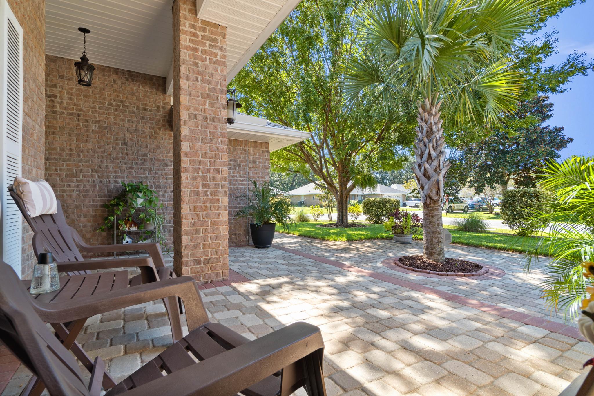 99 Inlet Drive Santa Rosa Beach, FL 32459 - Photo 41 of 52 a view of a backyard with sitting area