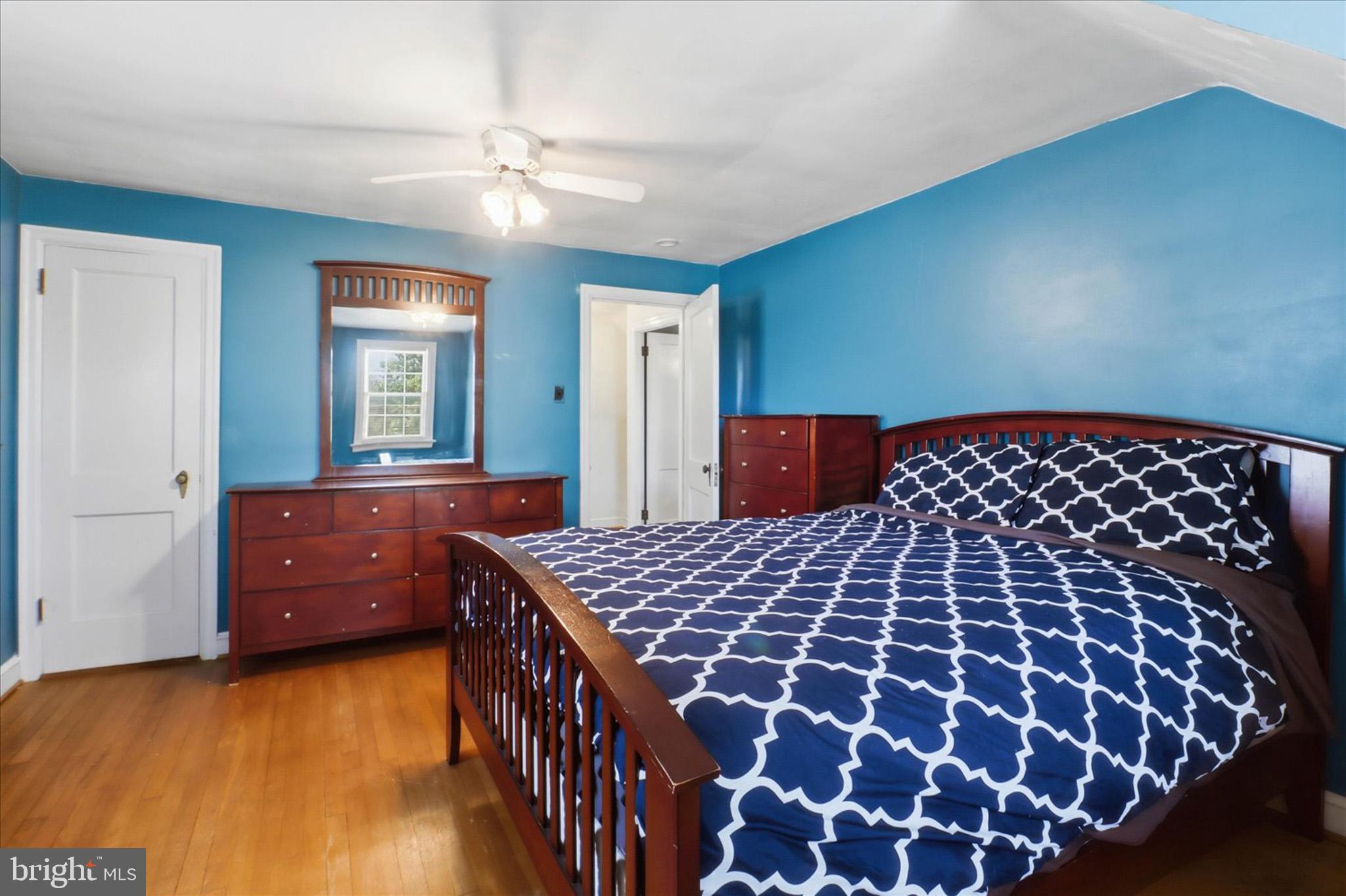 523 Pleasure Road Lancaster, PA 17601 - Photo 15 of 24 a bedroom with a bed and a dresser