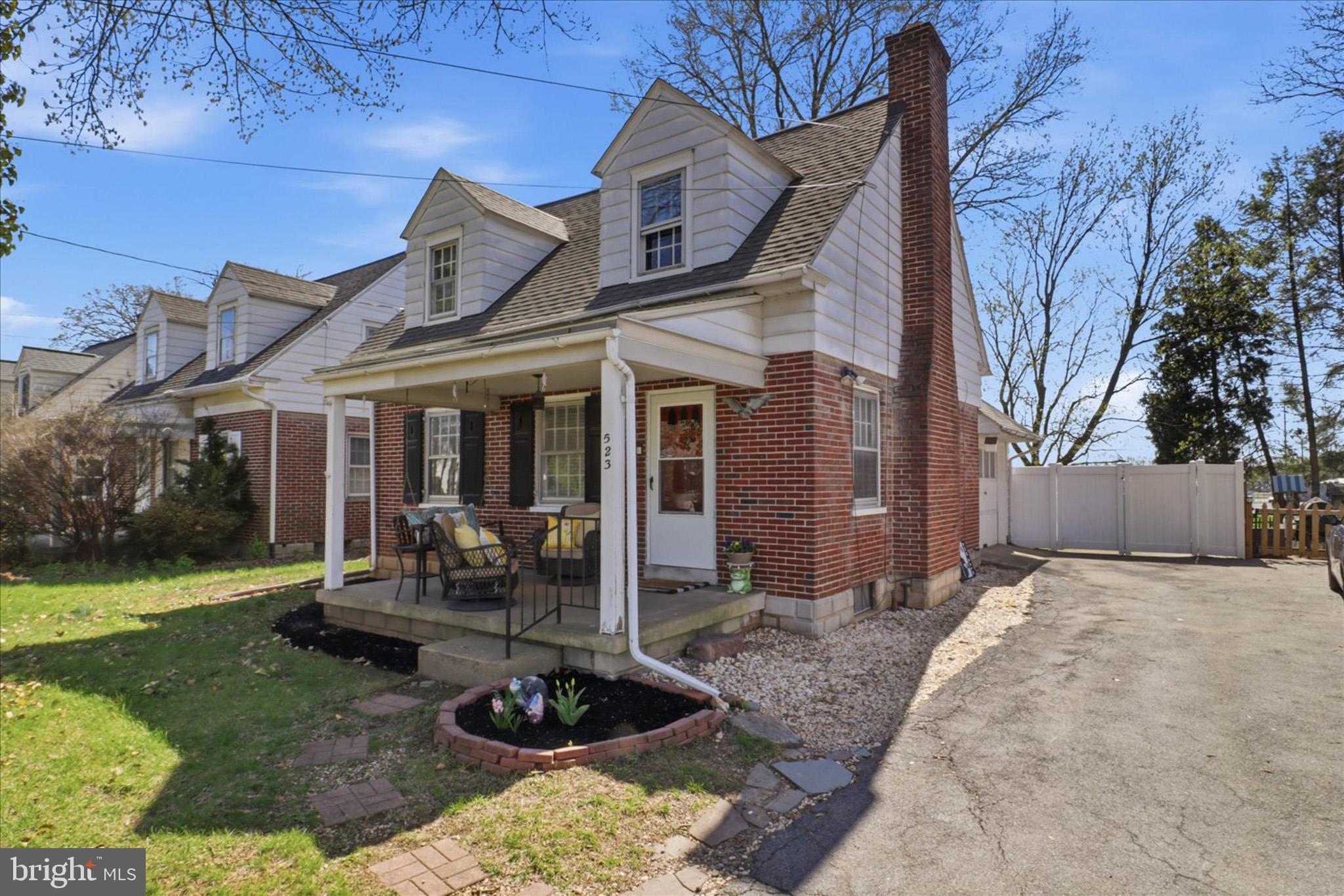 523 Pleasure Road Lancaster, PA 17601 - Photo 2 of 24 a view of a house with backyard porch and sitting area