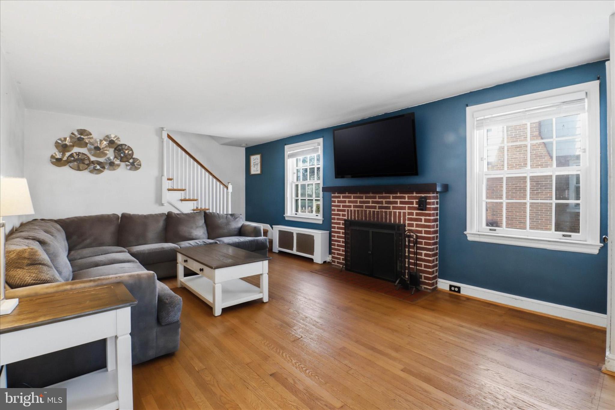 523 Pleasure Road Lancaster, PA 17601 - Photo 5 of 24 a living room with furniture fireplace and flat screen tv