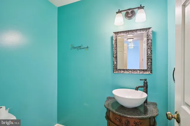 a bathroom with a toilet and a sink