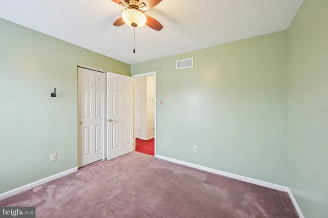 a view of empty room with a window