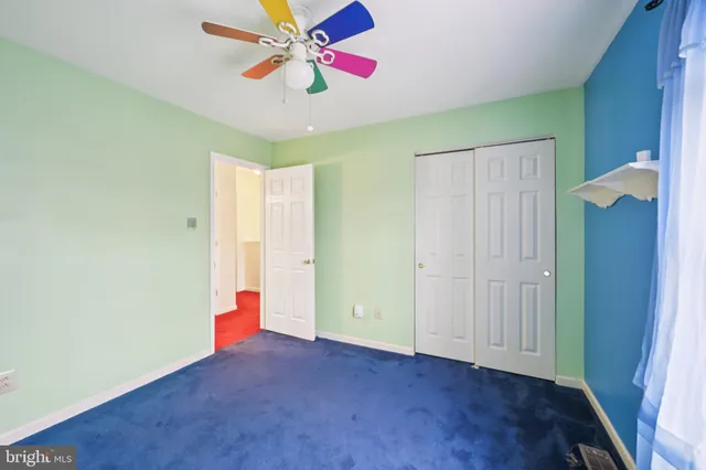 a view of empty room with painted walls