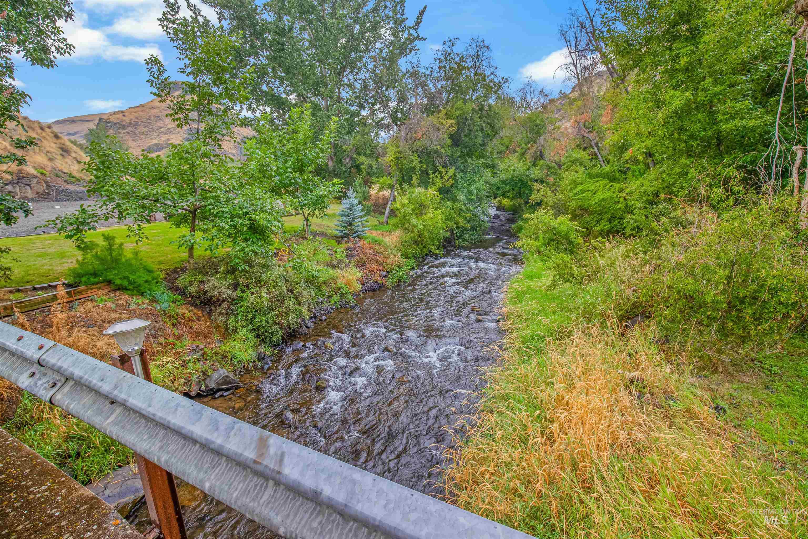 8385 Asotin Creek Road Asotin, WA 99402 - Photo 2 of 46 View of yard featuring a water view