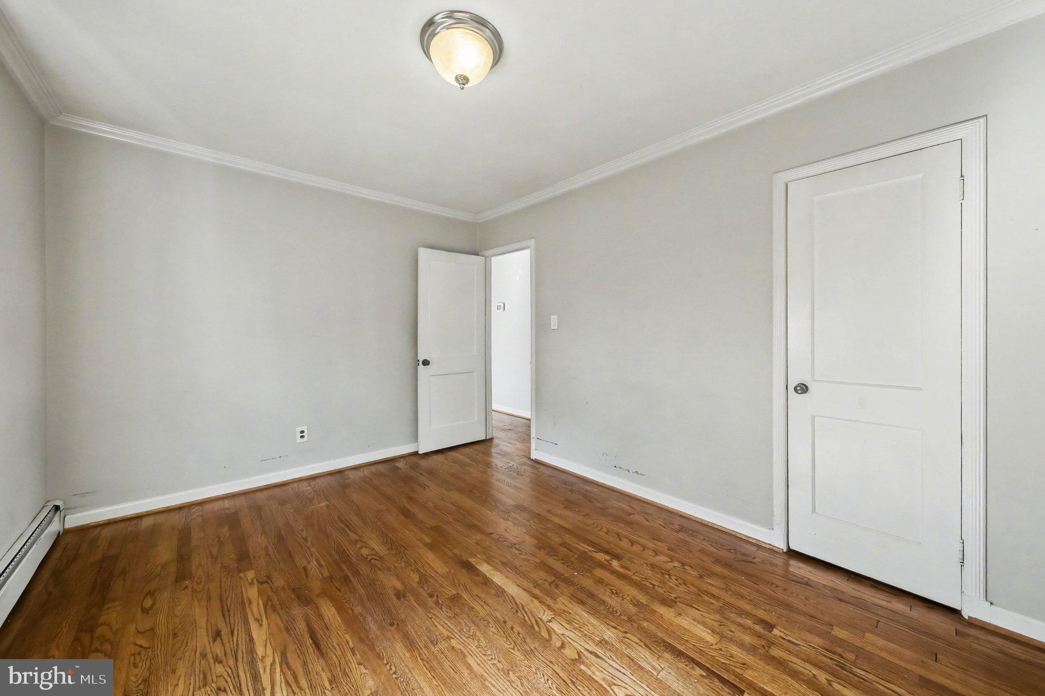 1750 Forrest Avenue Baltimore, MD 21234 - Photo 12 of 25 a view of room with wooden floor