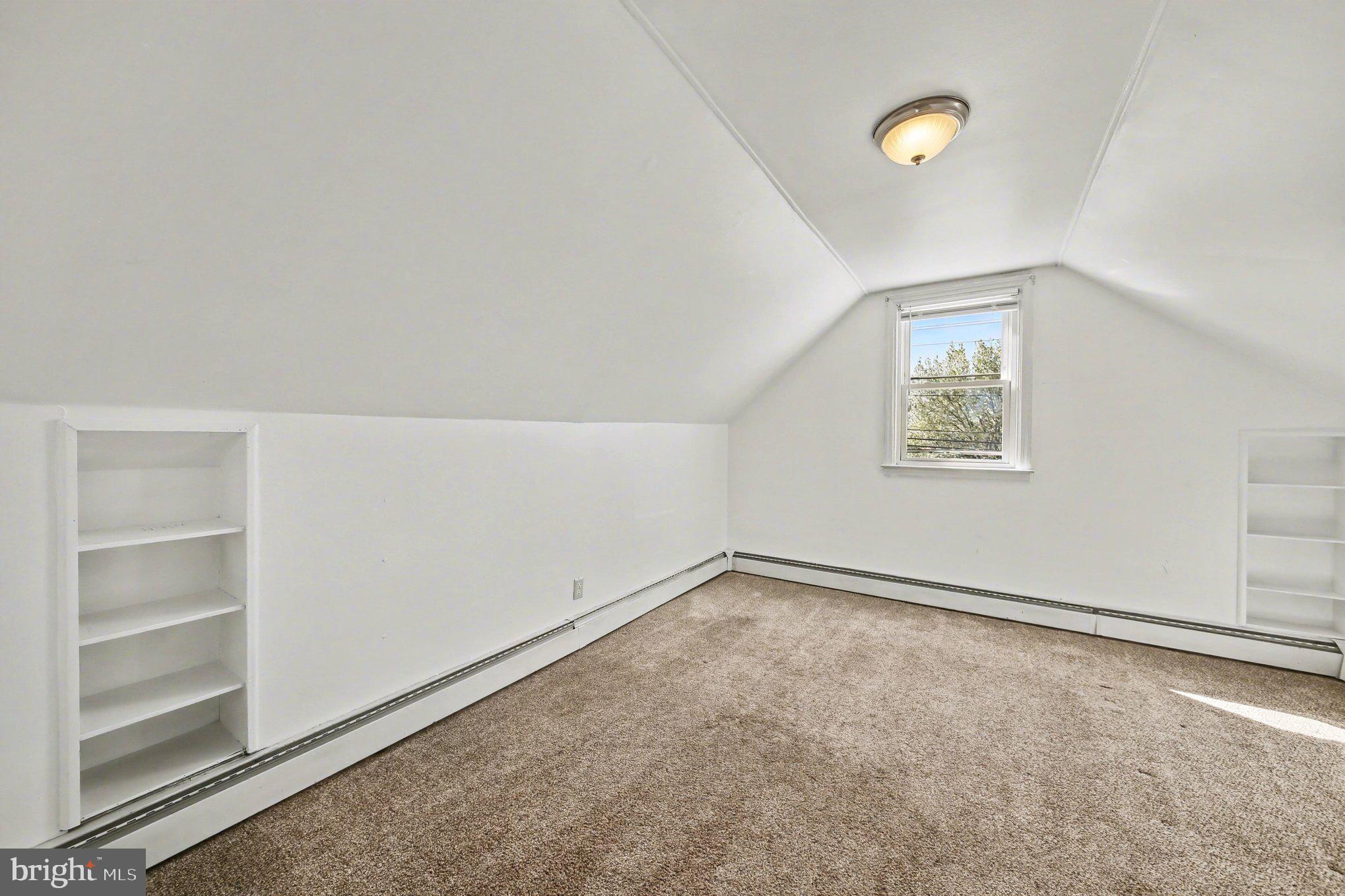 1750 Forrest Avenue Baltimore, MD 21234 - Photo 19 of 25 an empty room with a empty space and window