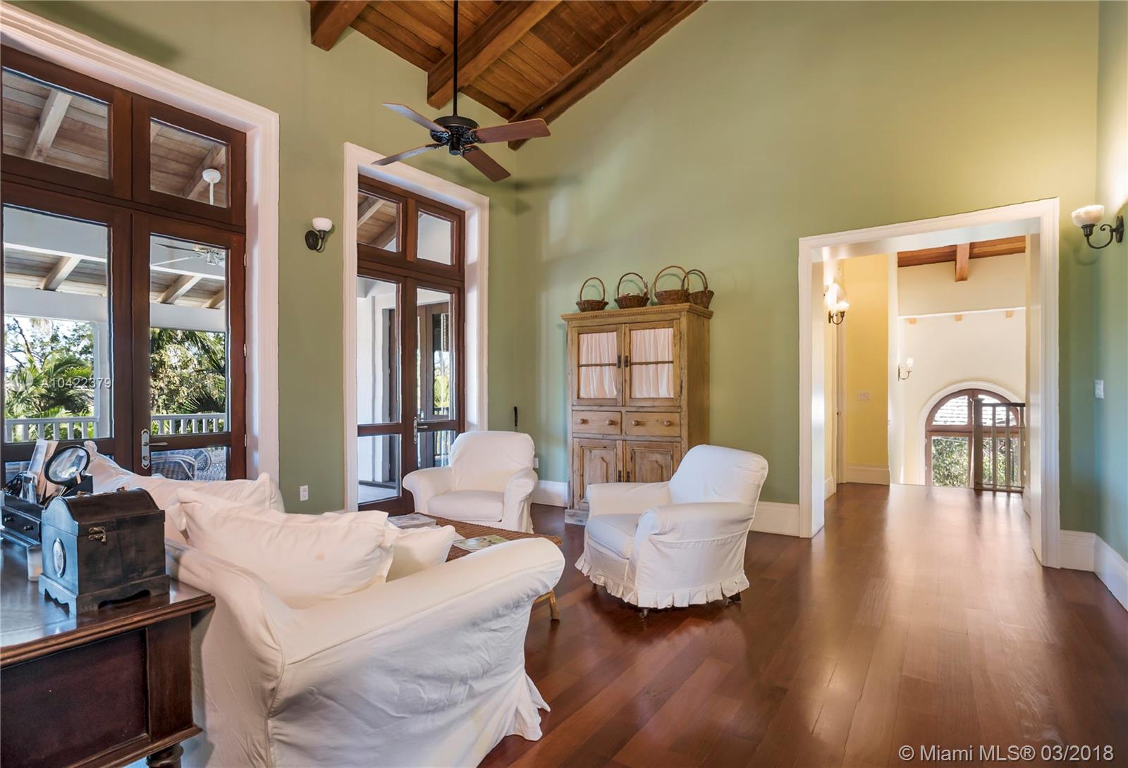 14 Harbor Point Key Biscayne, FL 33149 - Photo 11 of 45 a living room with furniture fireplace and wooden floor