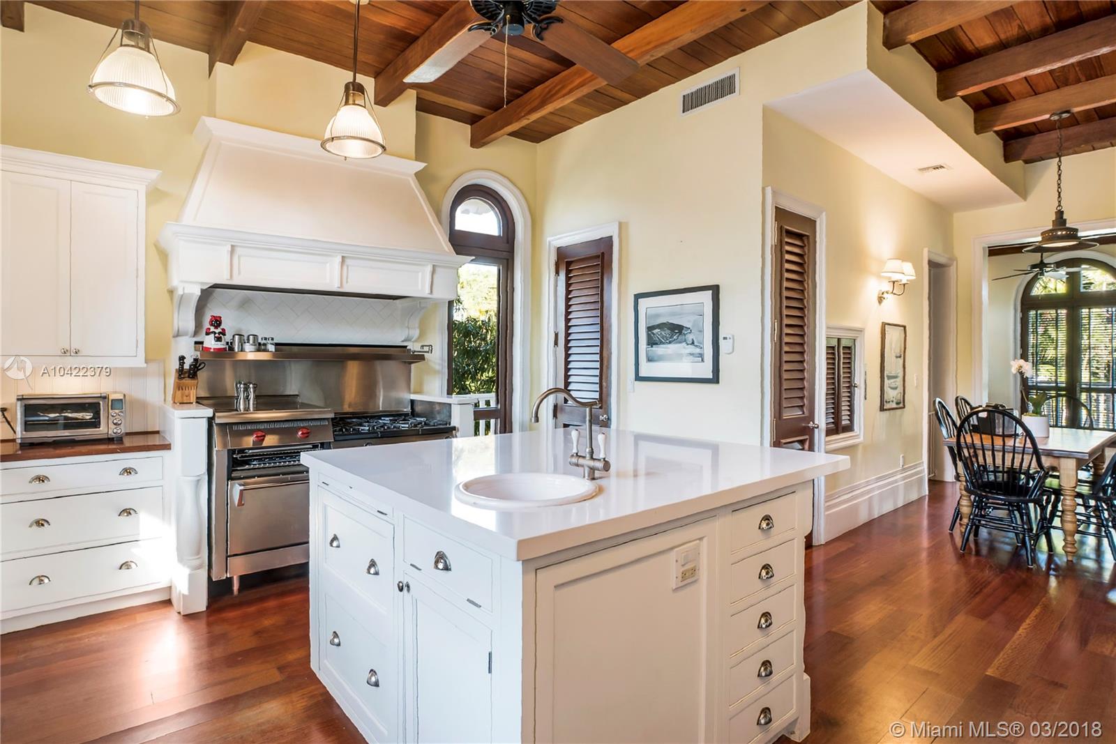14 Harbor Point Key Biscayne, FL 33149 - Photo 15 of 45 a kitchen with stainless steel appliances granite countertop a stove refrigerator and cabinets