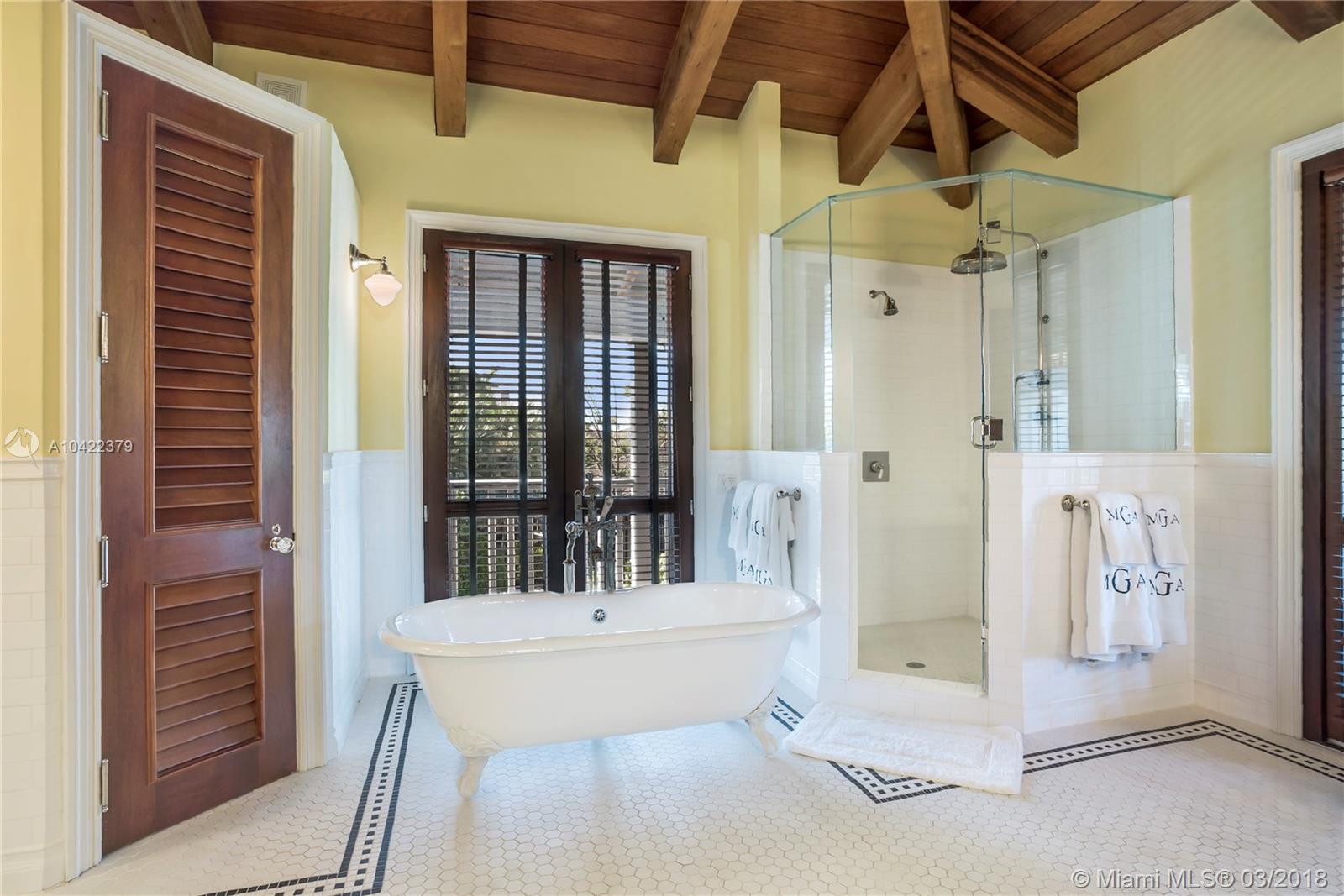 14 Harbor Point Key Biscayne, FL 33149 - Photo 22 of 45 a bathroom with a bathtub and shower
