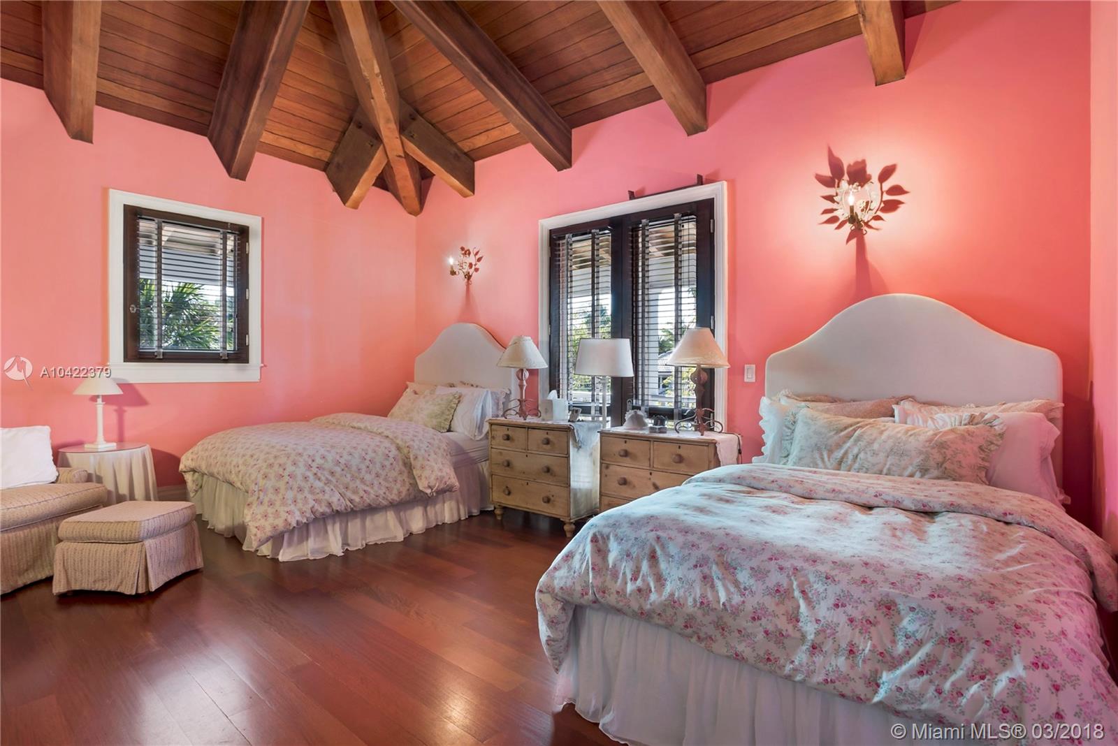 14 Harbor Point Key Biscayne, FL 33149 - Photo 25 of 45 a bedroom with two beds and a potted plant