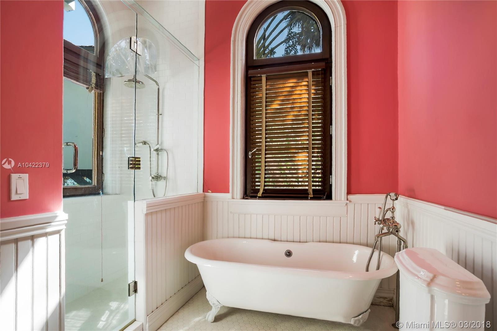 14 Harbor Point Key Biscayne, FL 33149 - Photo 27 of 45 a bathroom with a tub and a window