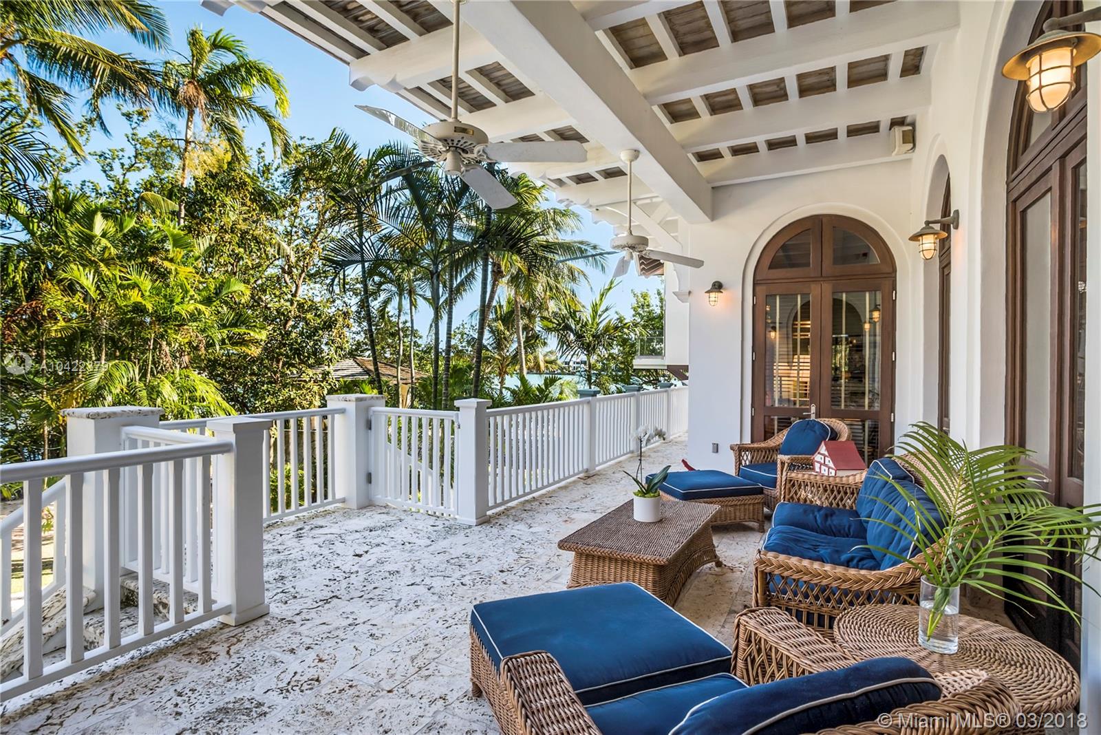 14 Harbor Point Key Biscayne, FL 33149 - Photo 29 of 45 a view of a couches and potted plant in the balcony