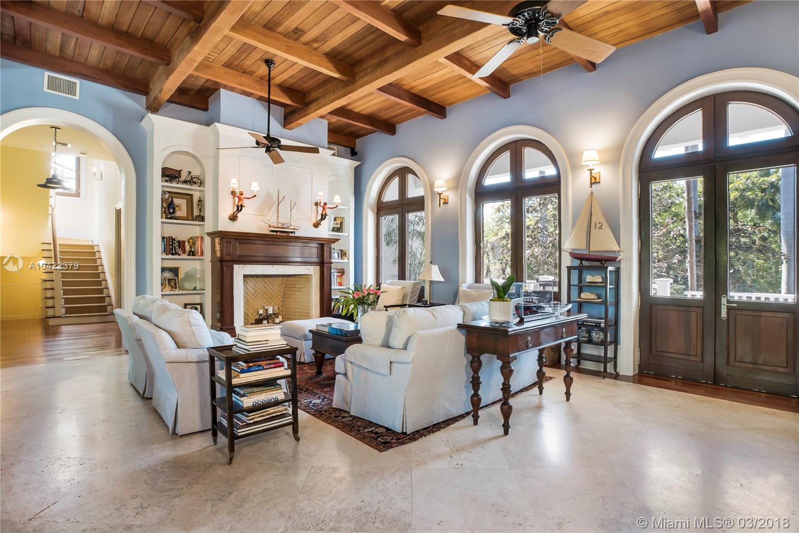 14 Harbor Point Key Biscayne, FL 33149 - Photo 4 of 45 a living room with fireplace furniture and a large window