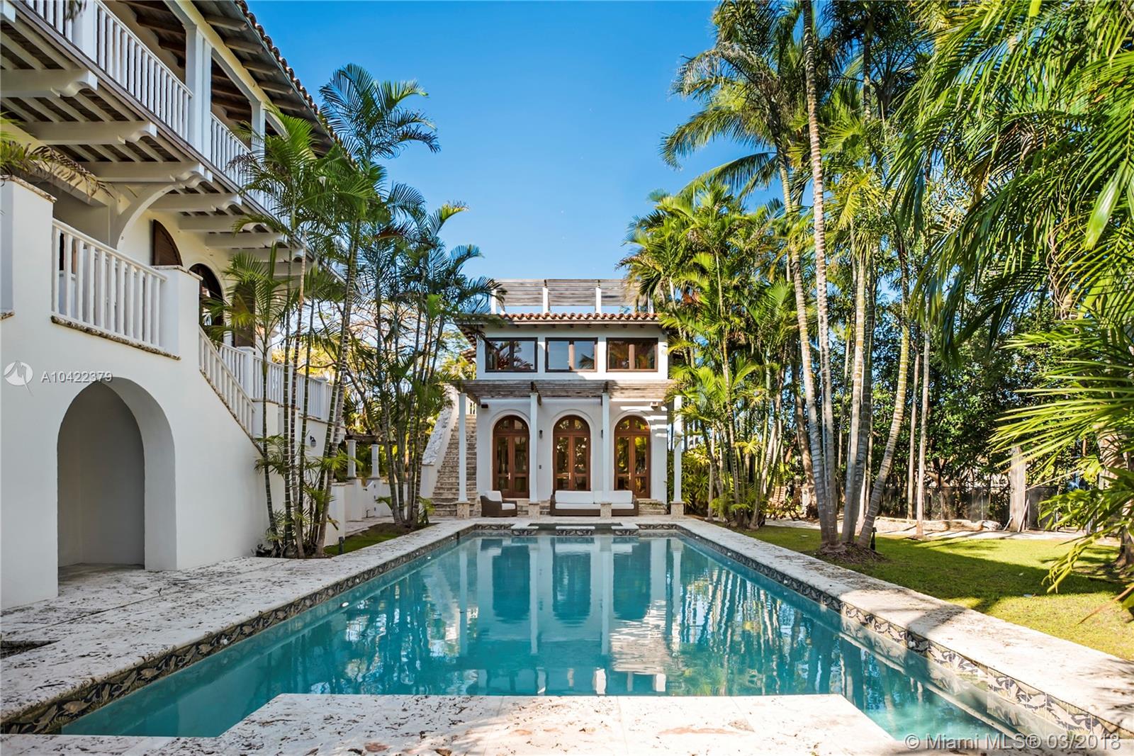 14 Harbor Point Key Biscayne, FL 33149 - Photo 35 of 45 a swimming pool with trees in front of it