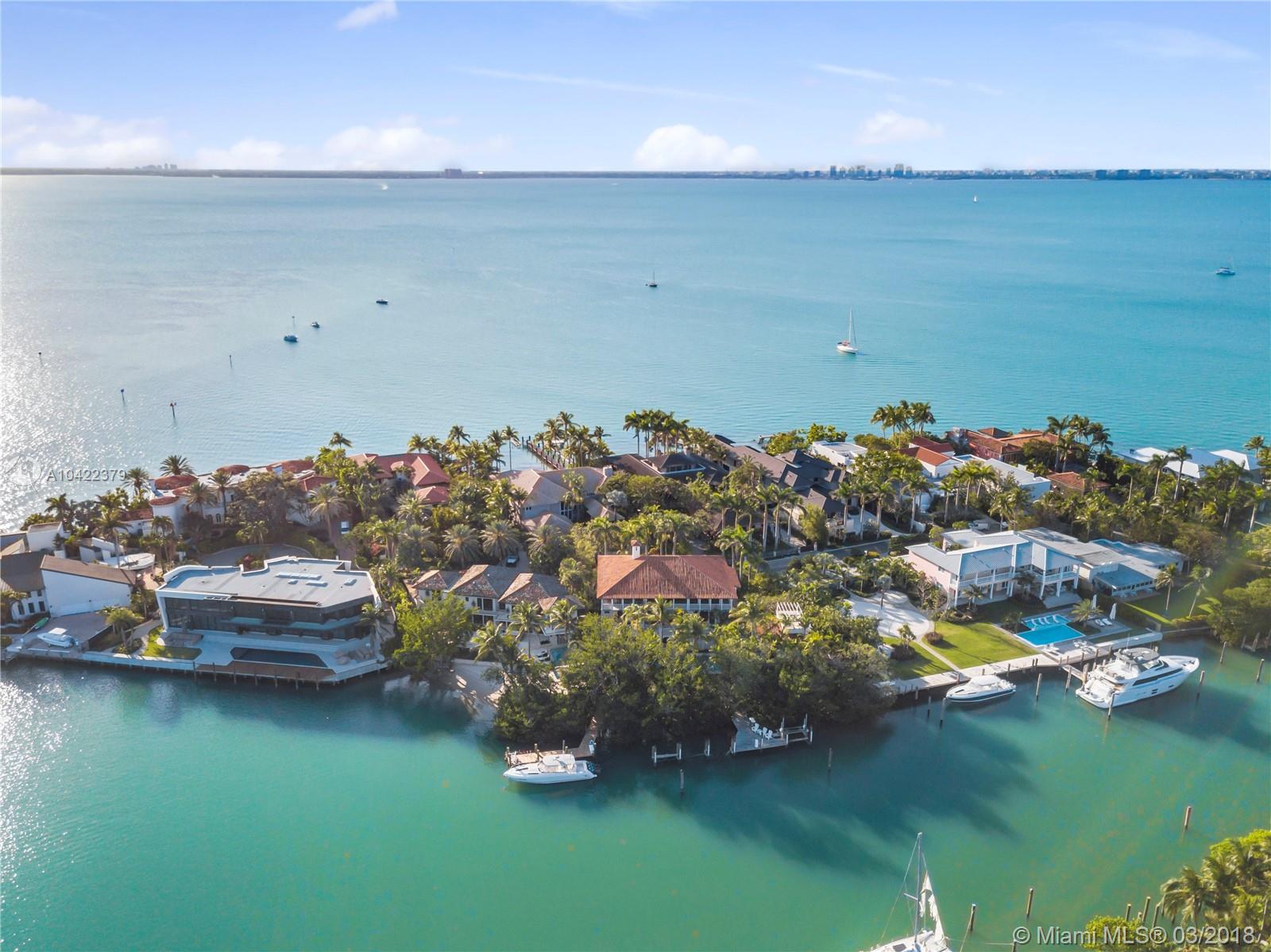 14 Harbor Point Key Biscayne, FL 33149 - Photo 43 of 45 a aerial view of a house with a garden and lake view