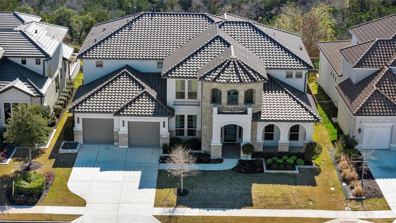 a aerial view of a house with entertaining space