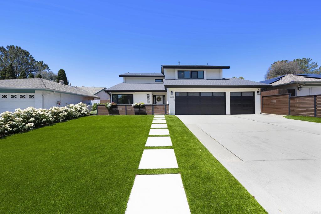 3577 Winslow Road Oceanside, CA 92056 - Photo 2 of 53 a front view of a house with a yard