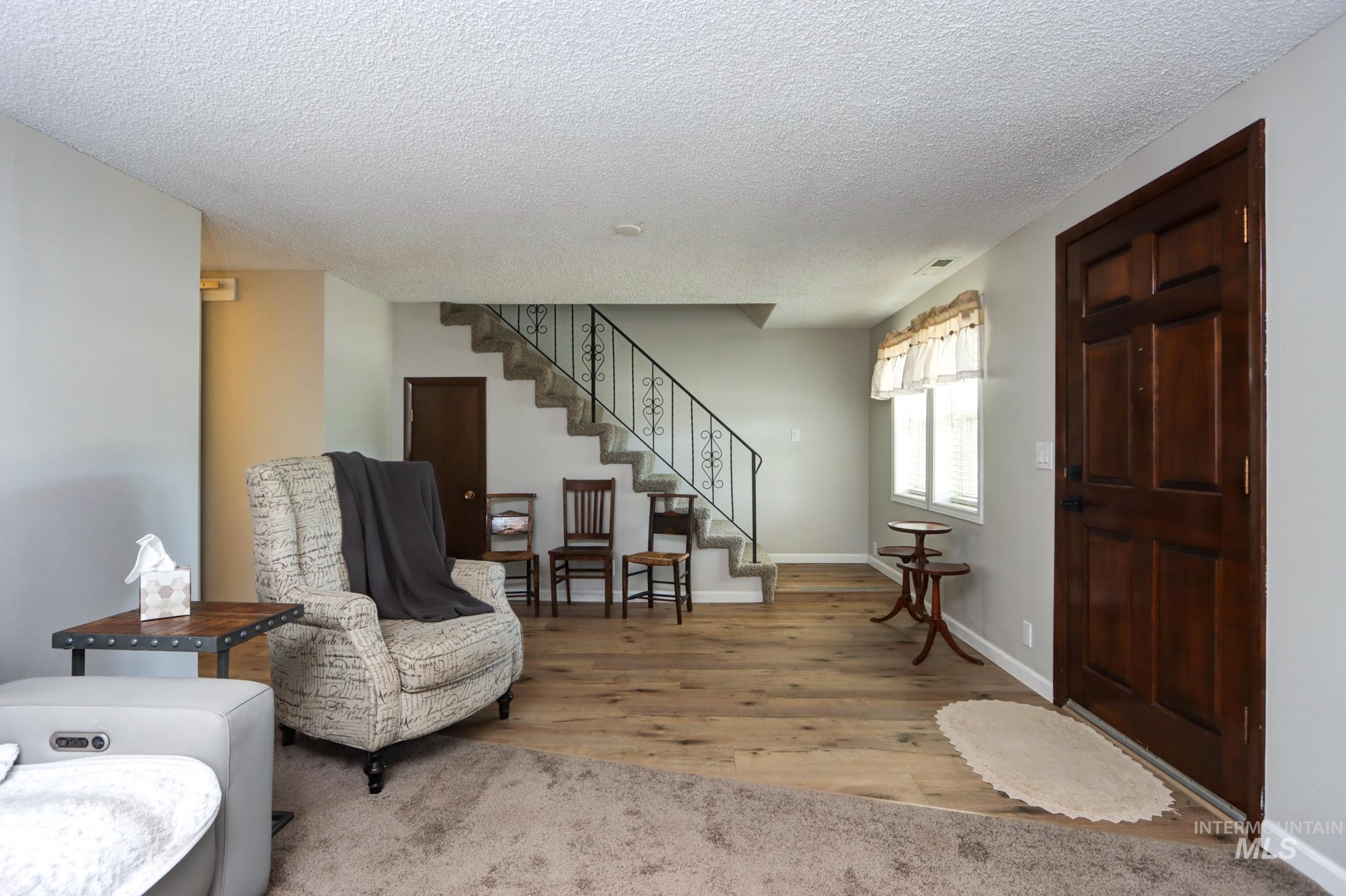 2528 Waterwheel Road Emmett, ID 83617 - Photo 17 of 50 Bright room featuring wood-finish flooring and light gray walls