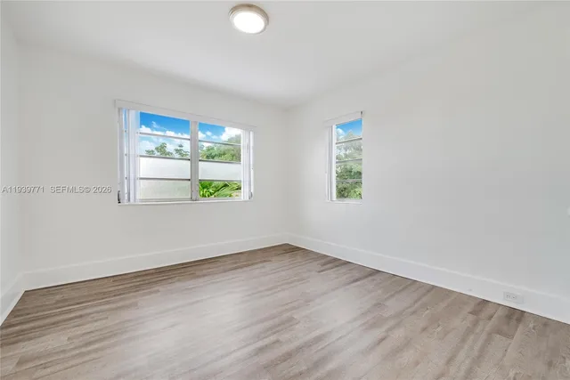 an empty room with window