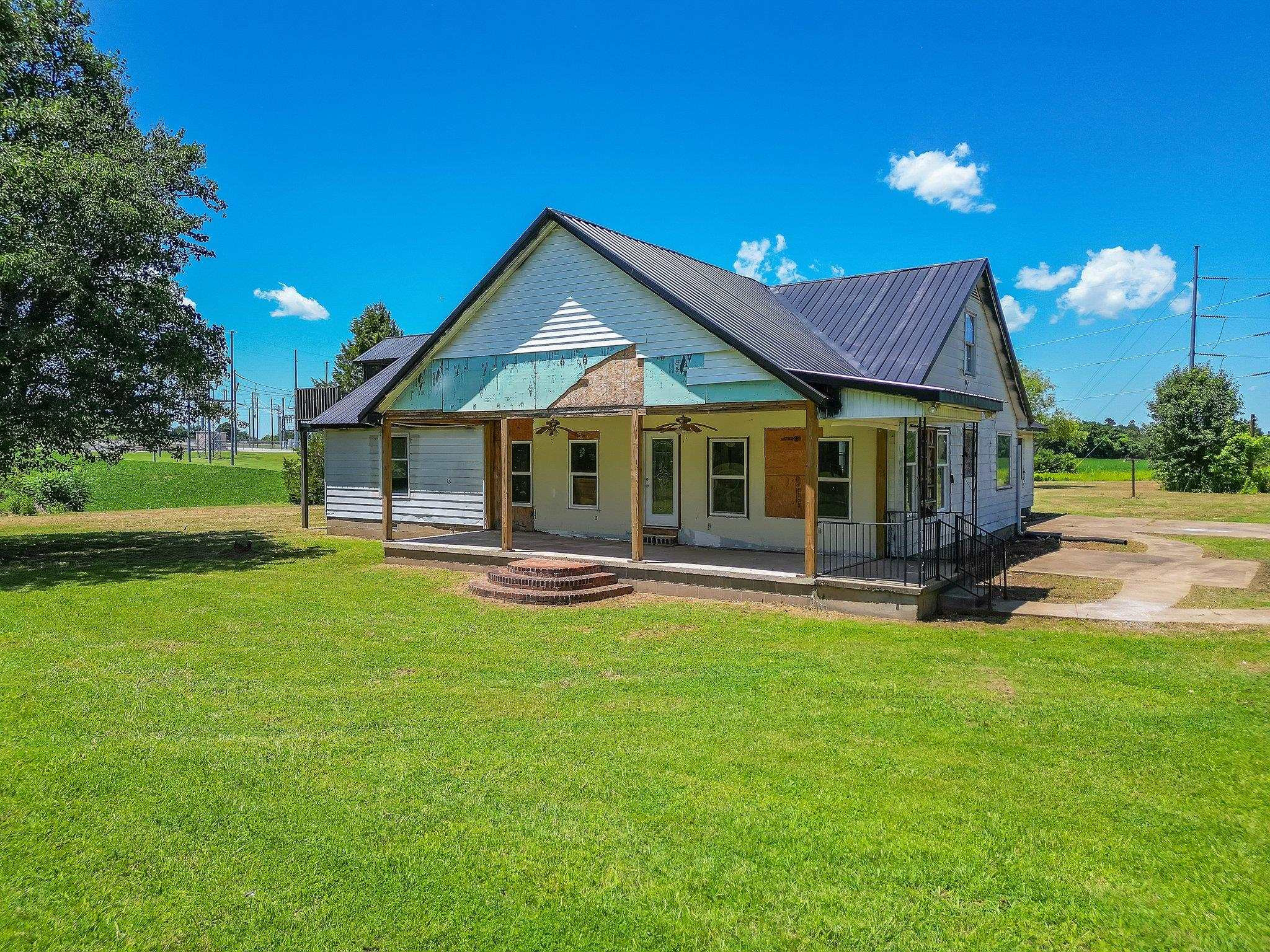 452 St John Road Denmark, TN 38391 - Photo 1 of 6 a view of a house with a yard porch and sitting area