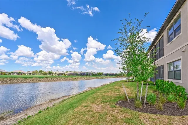 a view of a lake with a big yard