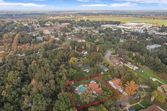 an aerial view of ocean and city